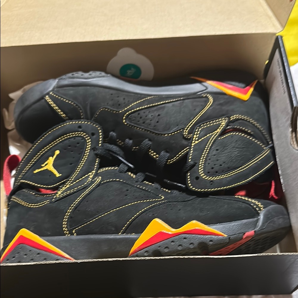 Jordan Black and Yellow Sneakers Iconic Design